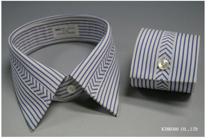 衿羽根は真ん中を横に、カフスも中心をカットしストライプをヘリンボーンのように配置したデザイン